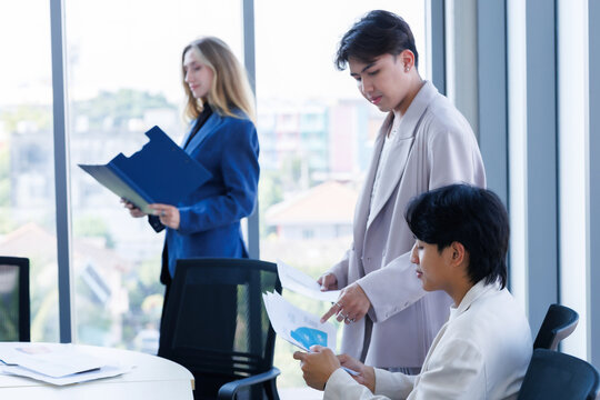 Successful happy workers Group of business people with Multiethnic workers with in company workers Group of asian business people and support Teamwork in the meeting room at modern office.