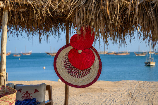 Doha, Qatar &ndash; November 29, 2023: Handicrafts and handmade items crafted from palm fronds, "Khous," decorate artisans' booths on Katara beach during the 13th Traditional Dhow Festival.