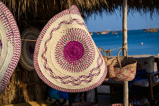 Doha, Qatar &ndash; November 29, 2023: Handicrafts and handmade items crafted from palm fronds, "Khous," decorate artisans' booths on Katara beach during the 13th Traditional Dhow Festival.