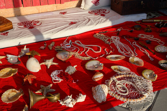 Doha, Qatar &ndash; November 29, 2023: Artisans' booths at the Katara Traditional Dhow Festival display ancient diving tools, pearl hunting, and oysters reflecting the economic legacy of ancestors.