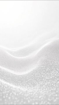 Glowing white particles floating in undulating waves, creating a clean futuristic motion background for titles