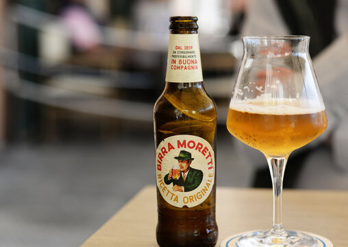 CAMOGLI, ITALY &ndash; MAY 5, 2026:  Bottle and glass of Moretti , an Italian beer since 1859, now part of the Heineken group, selective focus