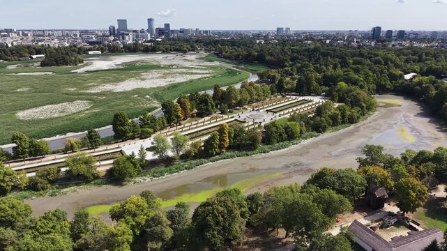 Aerial of drained Herastrau Lakebed in King Michael Park, Bucharest, Romania