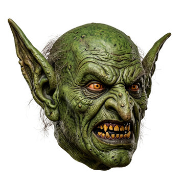 Scary green goblin mask with sharp teeth and glowing orange eyes, perfect for Halloween costumes and spooky decorations PNG Isolated on transparent background