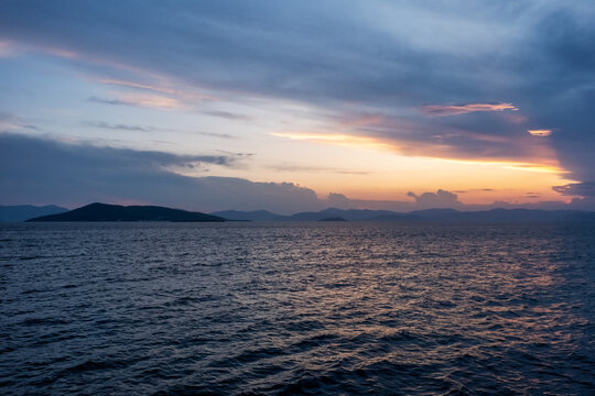 Mediterranean blue hour over the sea. Setting sun. Image shows the sun setting over the Mediterranean