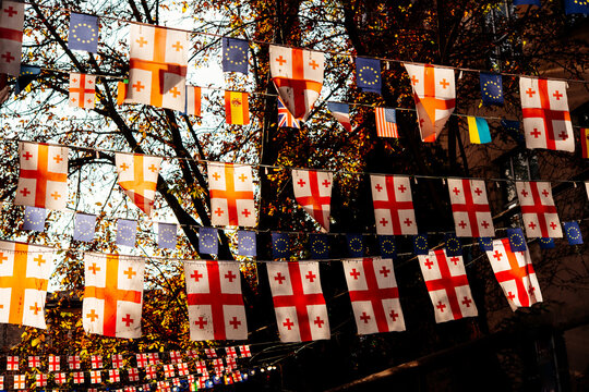 Flags of Georgia and EU seen in the streets of old town Sololaki in Tbilisi, Georgia.
