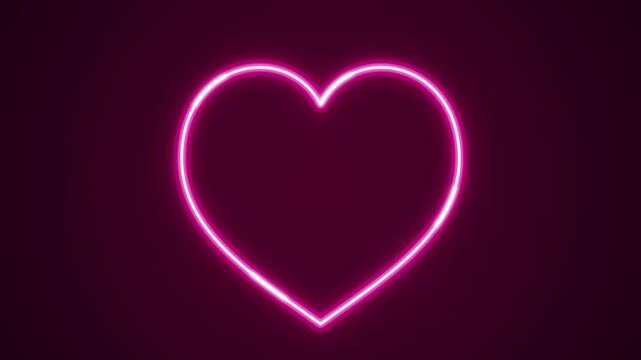 Glowing pink neon heart shape isolated on dark background, representing romance, love, and passion for Valentine's Day