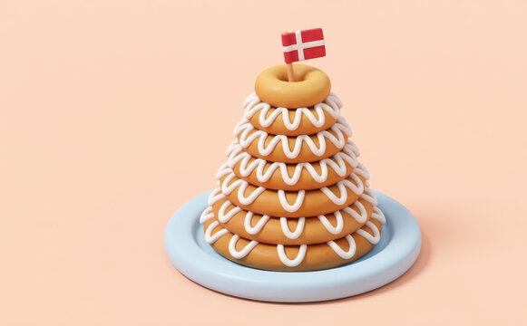 Danish Kransekage pyramid cake with frosting and flag on a plate for celebration and festive concepts