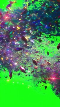 Luminous mineral ore particles swirling in a chaotic pattern against a solid green screen for post production