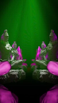 Meditating Statues in Green and Magenta Light Vertical