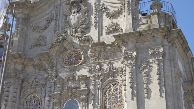 Stunning architectural details of the historic Carmo Church in Porto. A beautiful example of rococo style with intricate stone carvings. Tilt up
