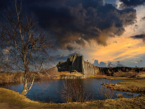 beautiful stone organ on a manor rock at sunset czech central mountains (czech republic)