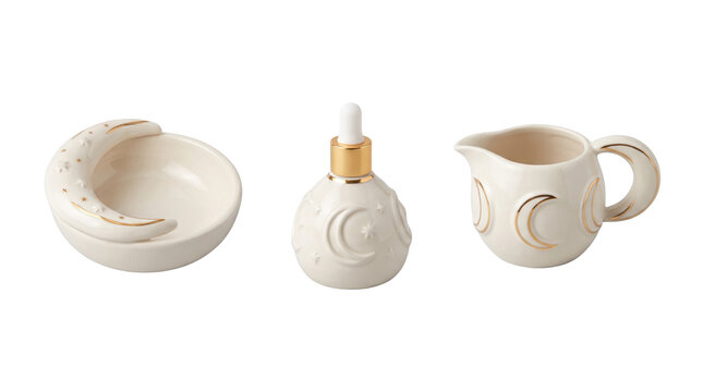 Ceramic trinket dish, dropper bottle, and creamer pitcher set with gold celestial moon and star accents isolated on a transparent background
