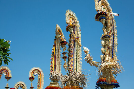 Penjor. Colorful penjor decorations adorn the landscape