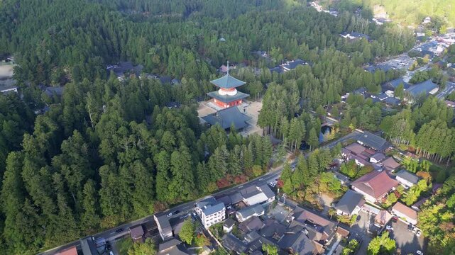 Koyasan, Japan: Aerial drone footage of the famous Koya San mountain village famous for its multiple ancient Buddhist temples and hiking trails in deep forest on ancient pilgrimage path in Wakayama Pr