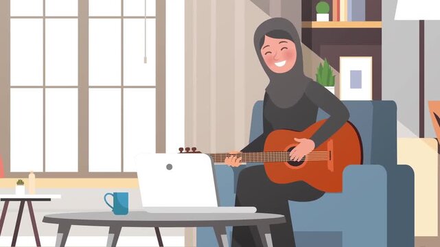 Smiling Muslim woman wearing a hijab playing acoustic guitar while sitting on sofa watching online tutorial laptop