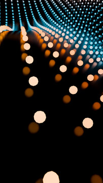 Abstract pattern of blue and orange glowing led lights