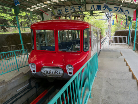 Takamatsu, Kagawa prefecture, Japan - April 16, 2018: Yakuri Cable funicular wagon stopped at the station