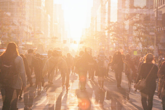 Crowd of anonymous people walking	