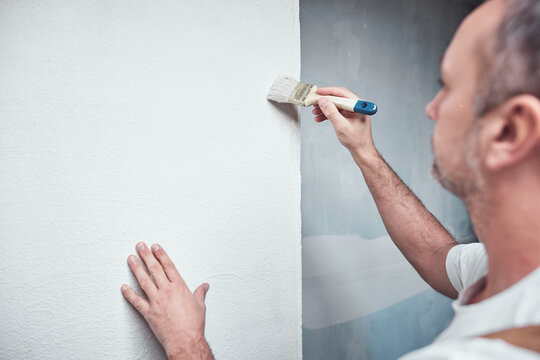 House painter working on a home renovation.