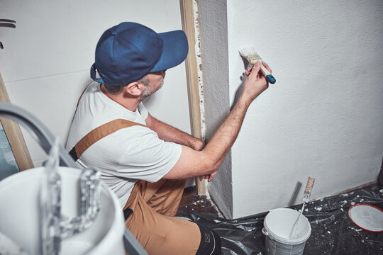 House painter working on a home renovation.