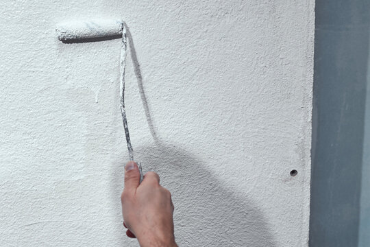 House painter working on a home renovation.