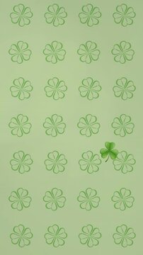 Vertical video: Solid glossy clover appearing then drifting across tiled grid, highlighting pattern