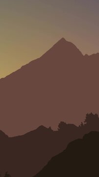 Vertical video: Camera panning revealing near ridges while mountain holding center to showcase dusk