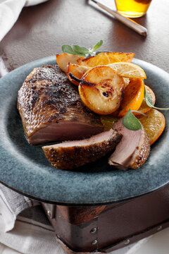 Roasted duck breast served with pear