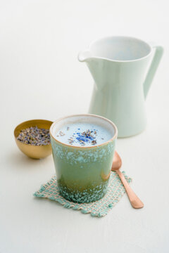 Moon Milk with lavender and spirulina blue in ceramic cup