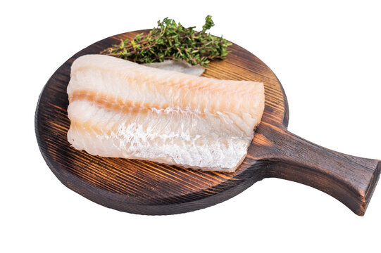Tender Pacific cod loin, raw fish fillet featuring a light hue and flaky texture, perfect for pan-searing or steaming. isolated on white background. top view