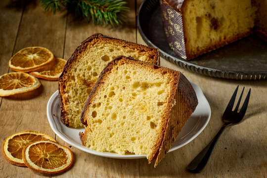 Panettone slices with caramel covered with chocolate, italian type of sweet bread