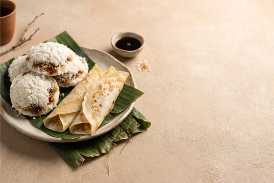 Traditional Bengali Pitha on Minimal Beige Background with Copy Space 