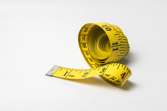 Yellow measuring tape for sewing and body measurement