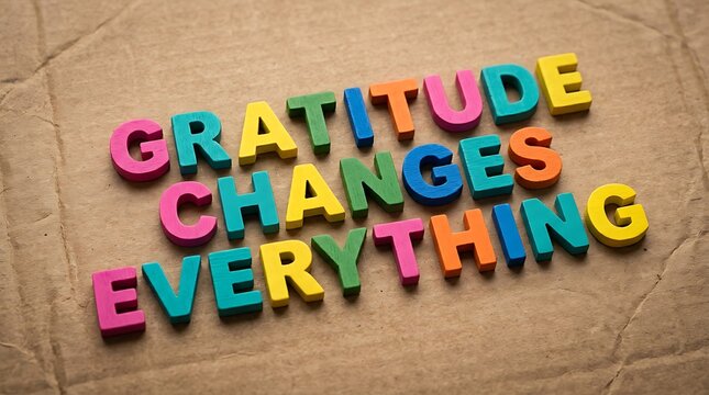 Colorful Wooden Block Letters Spelling Out Positive Message About Gratitude Transforming Life Perspective