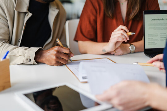Businesspeople are filling the business form