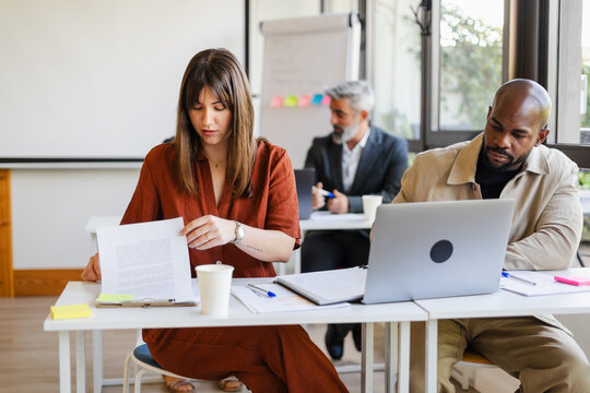 People are working on their projects in the open workspace
