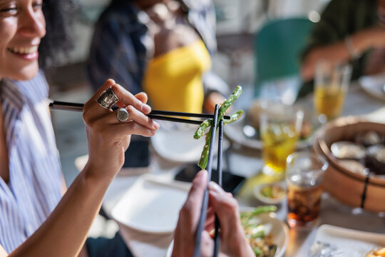 Friends enjoy food at a restaurant