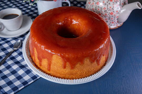 Brazilian bolo de goiabada guava cake with coffee on blue table