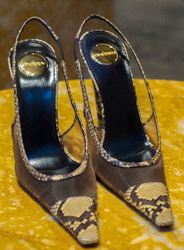 Eleganti d&eacute;collet&eacute; slingback Jema firmate Saint Laurent che uniscono la trasparenza del mesh alla texture esotica della vera pelle di pitone. Milan - Italy,23 October 2026