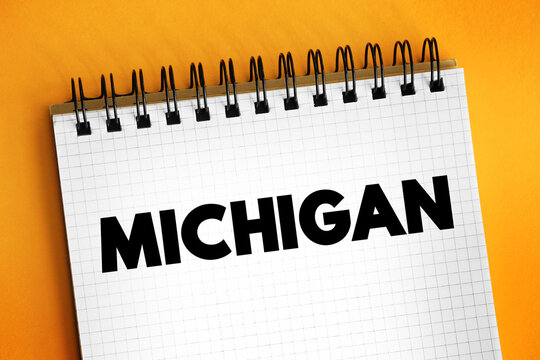 Michigan is a state in the Great Lakes region of the Upper Midwest region of the United States, text concept on notepad
