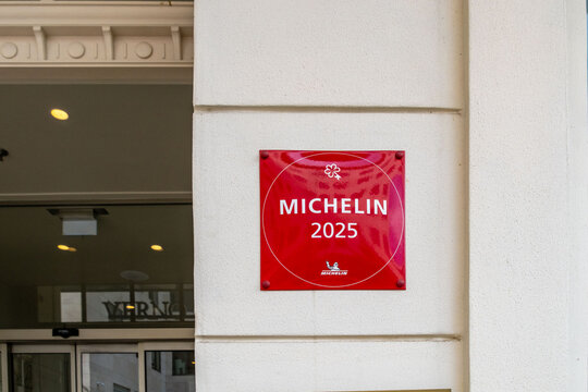 Michelin Guide 2025 red plaque wall, culinary excellence award, fine dining restaurant accreditation, gastronomy bib gourmand star rating, luxury hospitality benchmark, Budapest, Hungary
