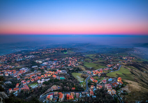 San Marino, a landlocked country within Italy from Monte Titano at dusk. 943