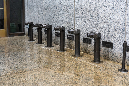 Row of Fire Department Connections Outside a Chicago Building