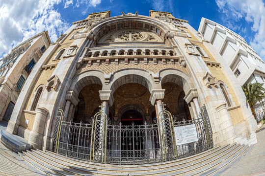 Tunis, Tunisia - October 27, 2025: Cathedral of Saint Vincent de Paul on Habib Bourguiba Avenue, the largest Roman Catholic cathedral in Tunisia, blending Neo-Gothic, Byzantine and Moorish styles.