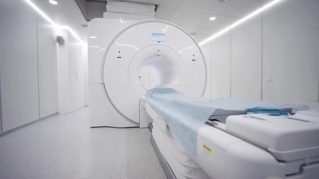 MRI machine in bright radiology room with padded examination table shown from changing angles during a clinical imaging scan setup