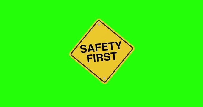4k Resolution Video: Safety, Prevention, Protection And Workplace Awareness Concept. Yellow Safety First Warning Sign Animating On Green Screen Chroma Key Background With Alpha Matte
