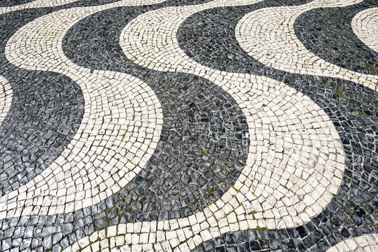 Black and white undulating plaster motif, Rossio, Pra&ccedil;a Rossio, Lisbon, Portugal
