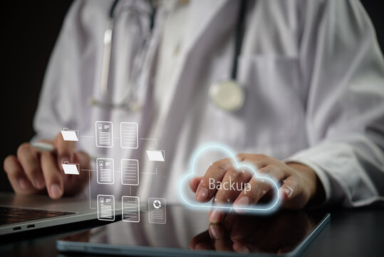 Medical cloud backup storage technology concept with doctor, tablet and document interface for database , electronic records and information management files.