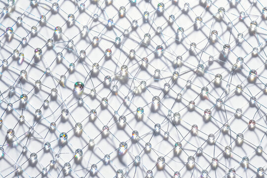 Glistening Dew Drops On Micro Filament Grid Macro Optical Texture